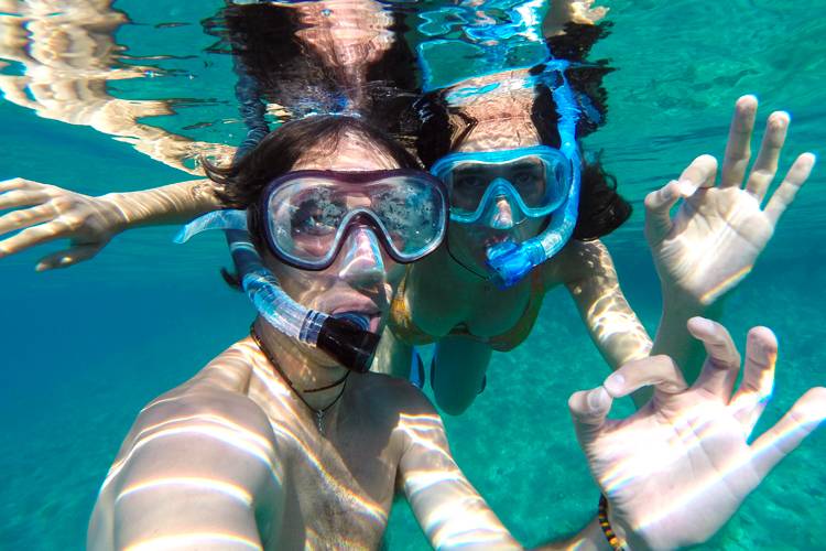 East Coast Living vacation renter enjoying snorkeling in Cocoa Beach